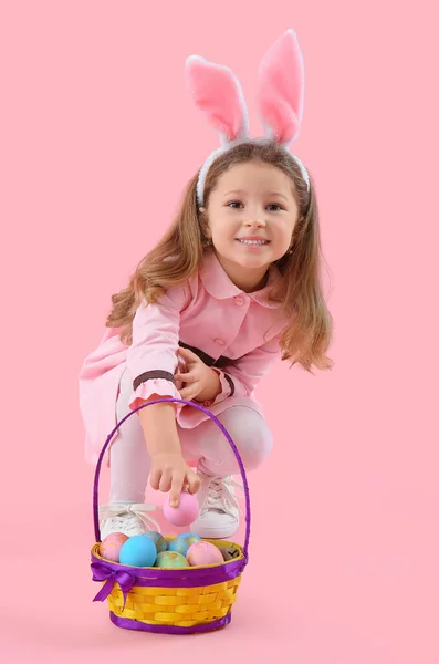 Cute Little Girl Bunny Ears Basket Easter Eggs Pink Background — 스톡 사진