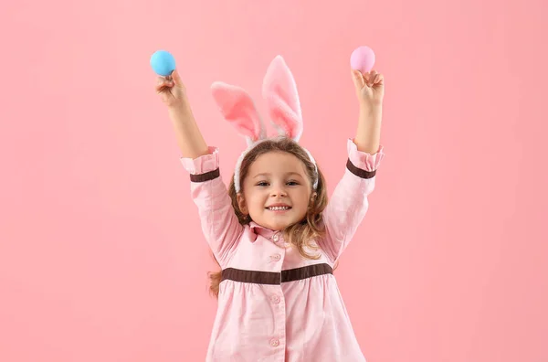 Cute Little Girl Bunny Ears Painted Easter Eggs Pink Background — Stok fotoğraf