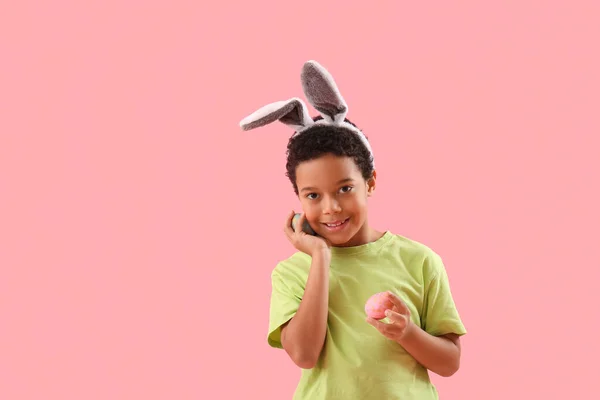 African American Little Boy Bunny Ears Easter Eggs Pink Background — Stock Photo, Image