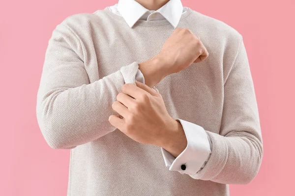 Young Man Rolling His Sleeve Pink Background Closeup — Stock Photo, Image