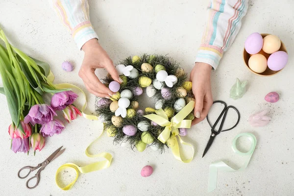 Woman Making Easter Wreath White Table Top View — Stock Photo, Image