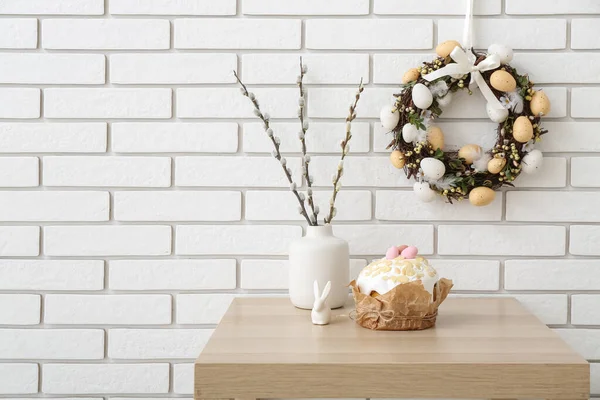 Table Willow Branches Vase Easter Cake Wreath White Brick Wall — Stock Photo, Image
