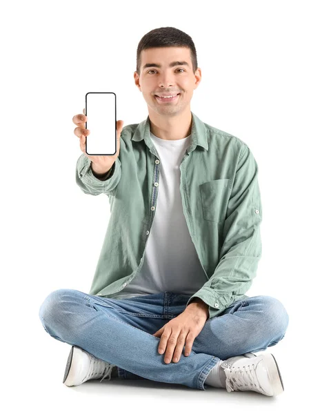 Junger Mann Mit Handy Auf Weißem Hintergrund — Stockfoto