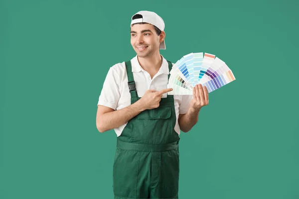 Male Painter Color Palettes Green Background — Fotografia de Stock