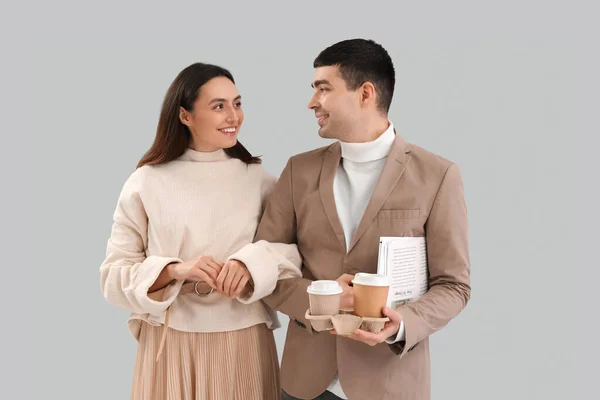 Lovely Young Couple Cups Coffee Light Background — Stock Photo, Image