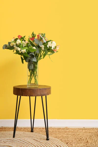 Vase Beautiful Alstroemeria Flowers Stool Yellow Wall — Stock Photo, Image