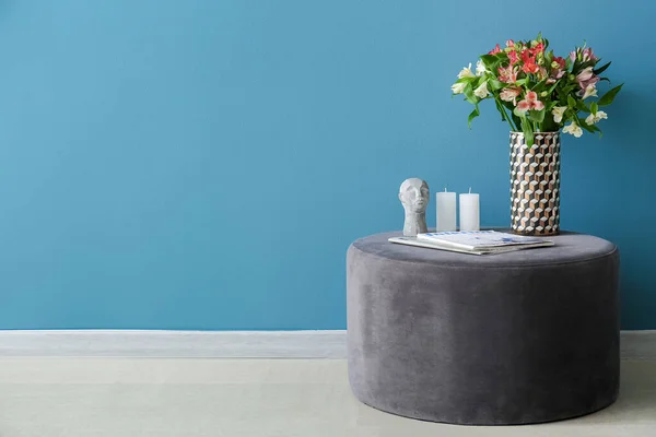 Vase Beautiful Alstroemeria Flowers Candles Magazine Pouf Blue Wall — Stock Photo, Image