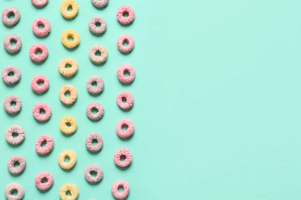 Many Colorful Cereal Rings Turquoise Background — Stock Photo, Image