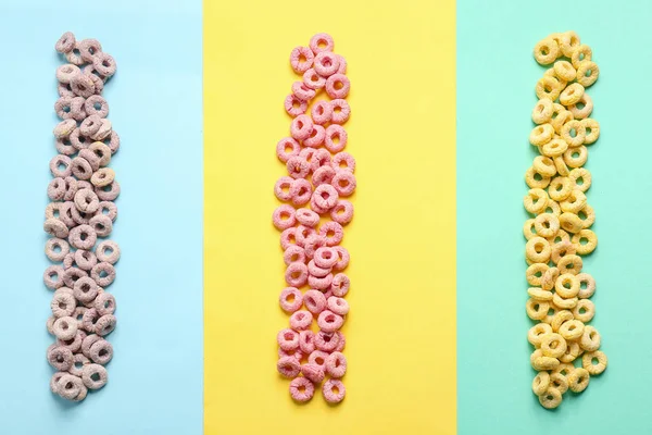 Muchos Anillos Cereales Diferentes Sobre Fondo Colorido — Foto de Stock