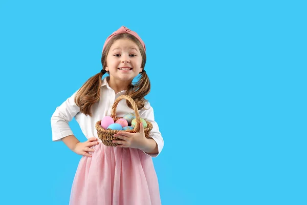 Cute Little Girl Basket Easter Eggs Blue Background — Stok fotoğraf