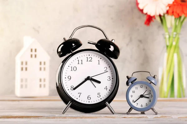 Alarm Clocks Table Grey Grunge Background — Stock Photo, Image