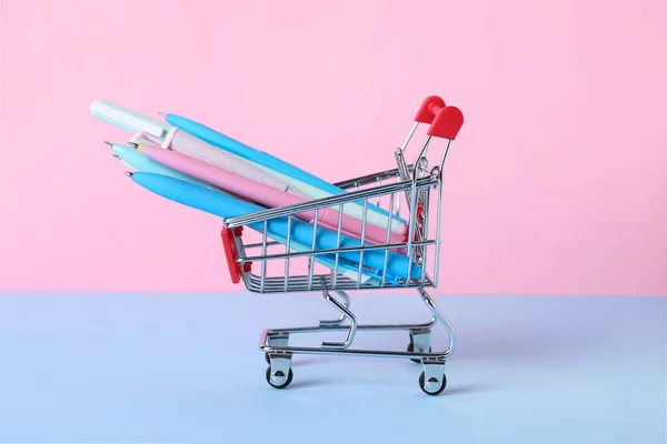 Shopping Cart Different Pens Color Background — Stock Photo, Image
