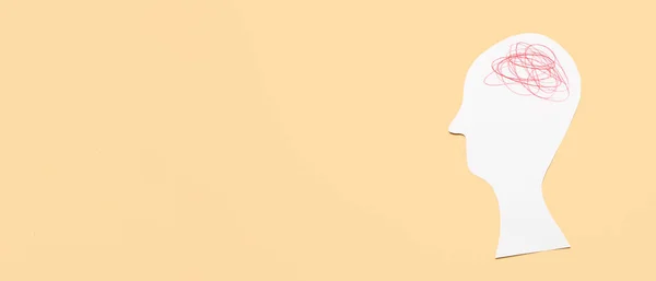 Paper human head on beige background with space for text. Concept of neurology