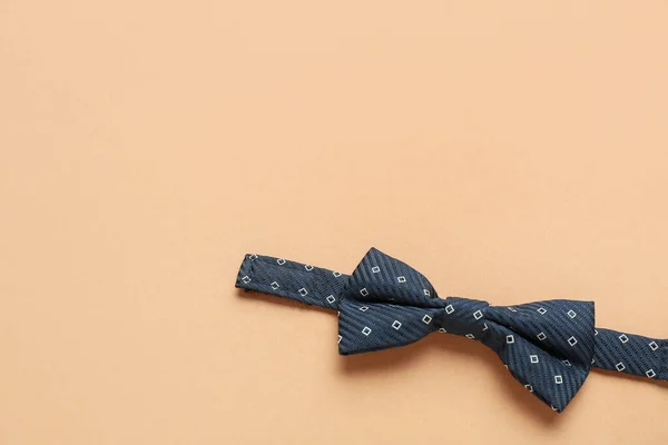 stock image Stylish male bow tie on color background