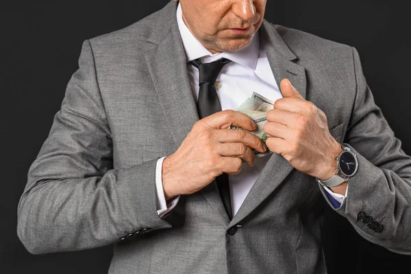 Mature Businessman Hiding Bribe Jacket Dark Background Closeup — Stock Photo, Image