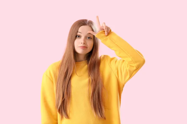 Young Woman Hoodie Showing Loser Gesture Pink Background — Stock Photo, Image