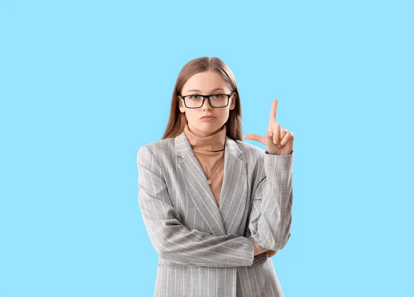 Young Businesswoman Showing Loser Gesture Blue Background — Stock Photo, Image