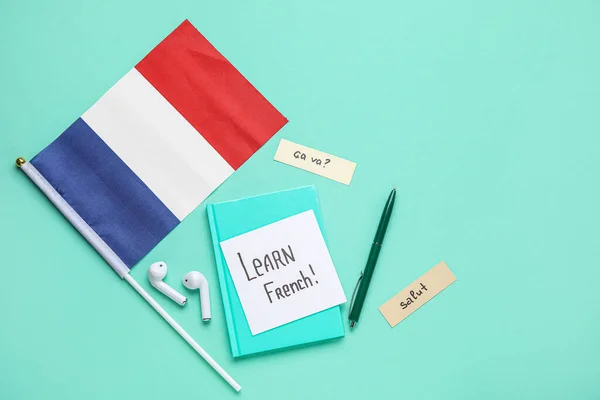 Paper Text Learn French Stationery Earphones Flag Green Background — Stock Photo, Image