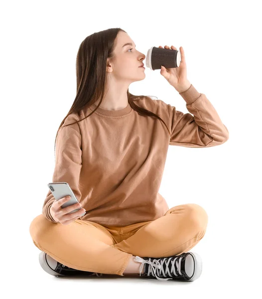 Pretty Young Woman Smartphone Drinking Coffee While Sitting White Background — Fotografia de Stock