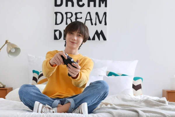 Teenage Boy Playing Video Game Bedroom — Stock Photo, Image