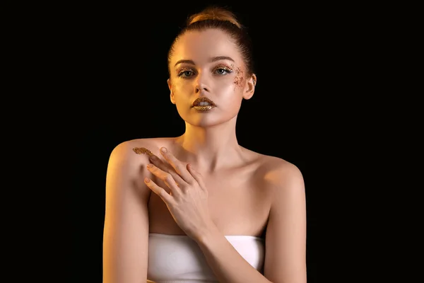 Young Woman Golden Glitter Makeup Black Background — Stock Fotó