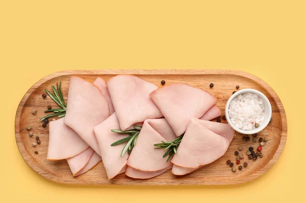 Board Slices Tasty Ham Rosemary Peppercorn Yellow Background — Stock Photo, Image
