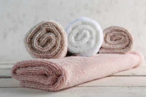 Rolled Soft Towels Wooden Table — Stock Photo, Image