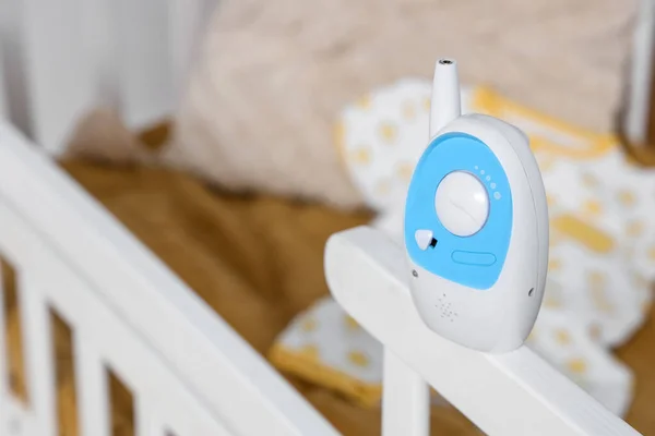 stock image Baby monitor on crib in children's bedroom, closeup