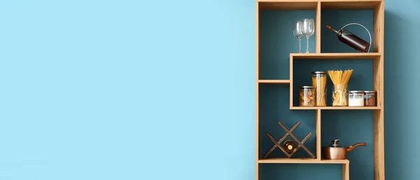 Wooden Shelving Unit Products Blue Wall Kitchen Banner Design — Stock Photo, Image