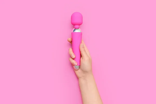 stock image Woman with vibrator from sex shop on pink background