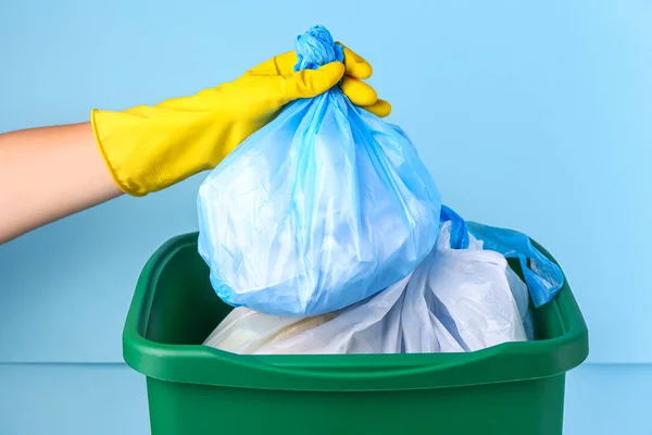 Woman Throwing Garbage Bin Recycle Bin Blue Background Closeup — Stock Photo, Image