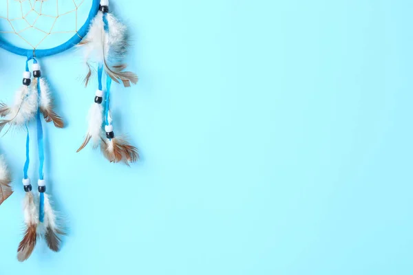 stock image Beautiful dreamcatcher on blue background