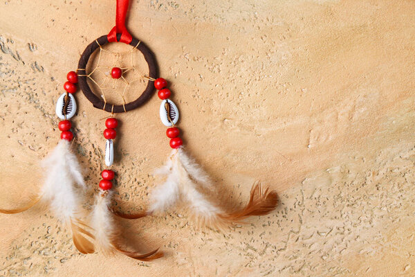 Beautiful dreamcatcher on grunge background