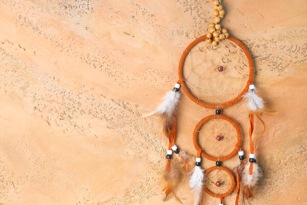 Beautiful dreamcatcher on grunge background