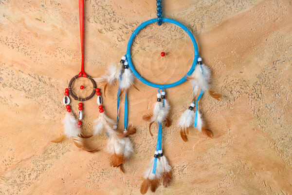 Beautiful dreamcatchers on grunge background