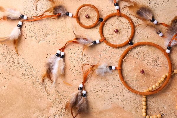 Beautiful dreamcatcher on grunge background