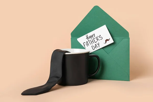 stock image Cup, tie, envelope and card with text HAPPY FATHER'S DAY on color background