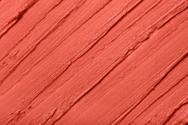 Arkaplan olarak mercan boyalı dokunun yakın görüntüsü