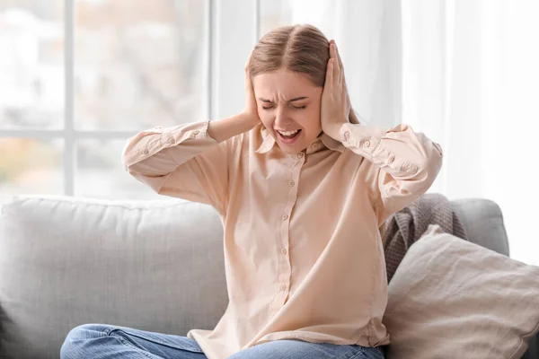 Angry Young Woman Suffering Loud Noise Home — Stock Photo, Image