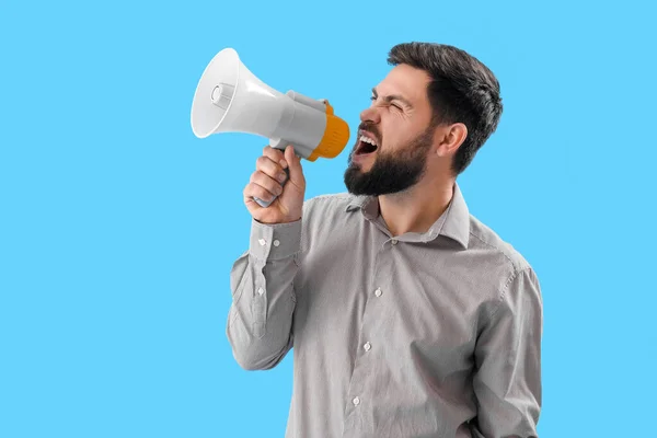 Angry Young Man Shouting Megaphone Blue Background — Stock Photo, Image
