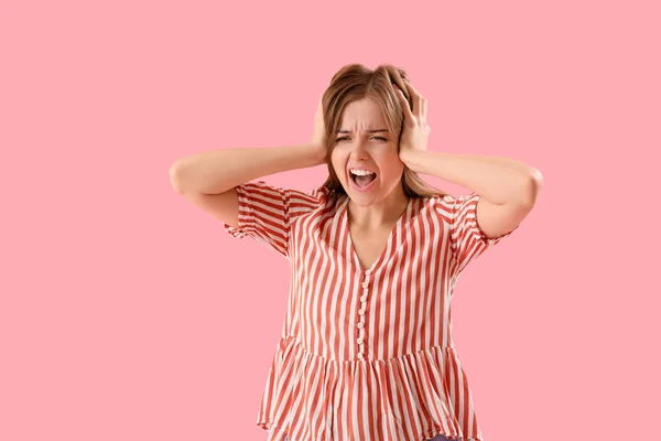 Angry Young Woman Suffering Loud Noise Pink Background — Stock Fotó