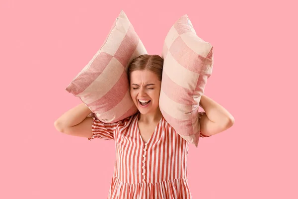 Young Woman Pillows Suffering Loud Noise Pink Background — ストック写真