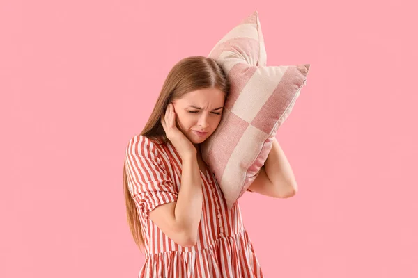 Young Woman Pillow Suffering Loud Noise Pink Background — Stockfoto