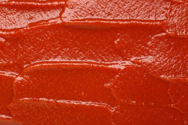 Arka plan olarak lezzetli domates ezmesinin yakın görünümü