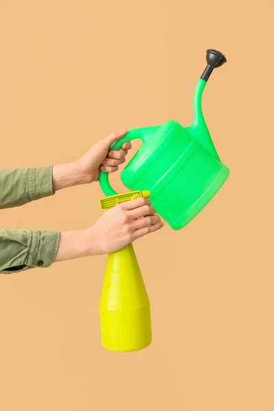 Female Gardener Watering Can Spray Bottle Beige Background — Stock Photo, Image