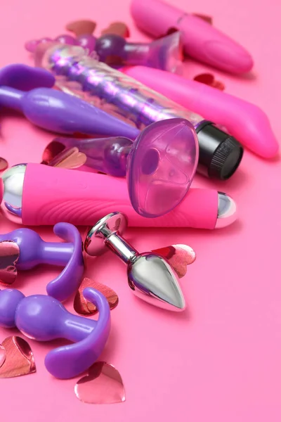 Różne Zabawki Seksualne Różowym Tle Zbliżenie — Zdjęcie stockowe