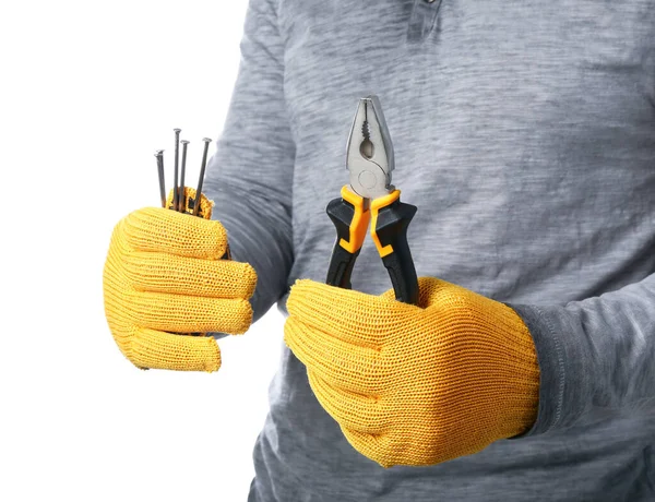 Man Gloves Holding Pliers Nails White Background — Stock Photo, Image