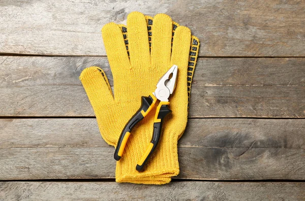 Pliers Gloves Wooden Background — Stock Photo, Image