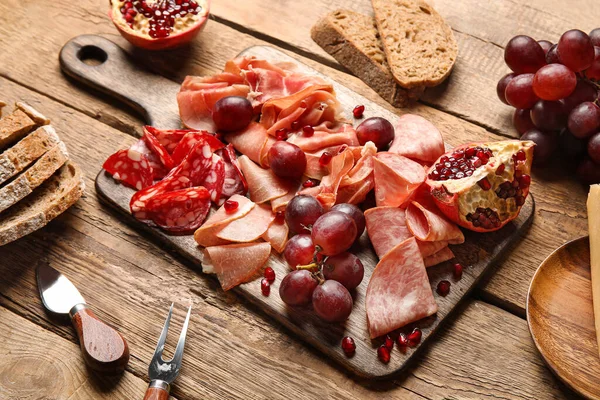 Board Assortment Tasty Deli Meats Wooden Background — Stock Photo, Image