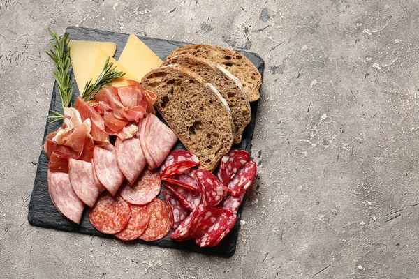Slate Plate Assortment Tasty Deli Meats Bread Cheese Grey Background — Stock Photo, Image